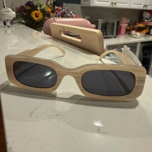 Stylish Beige Sunglasses with Dark Lenses